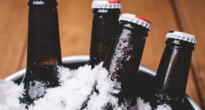 beer-chronicle-houston-craft-beer-review-what-is-skunked-beer-brown-bottles-on-ice