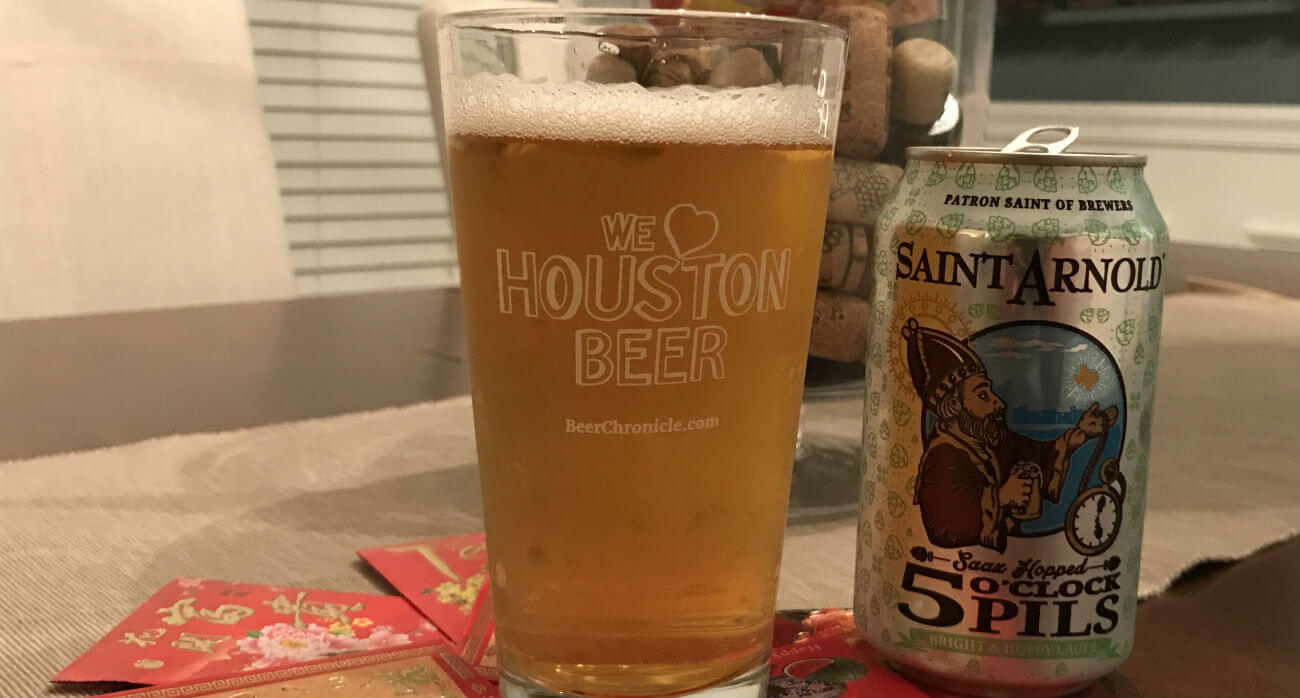 Beer-Chronicle-Houston-Craft-Beer-Review-5-OClock-Pils-Beer-In-Pint-Glass-Next-To-Can