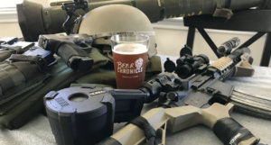 Beer-Chronicle-Houston-Craft-Beer-Review-Buffalo-Bayou-1836-Beer-In-Pint-Glass-Surrounded-By-Firearms
