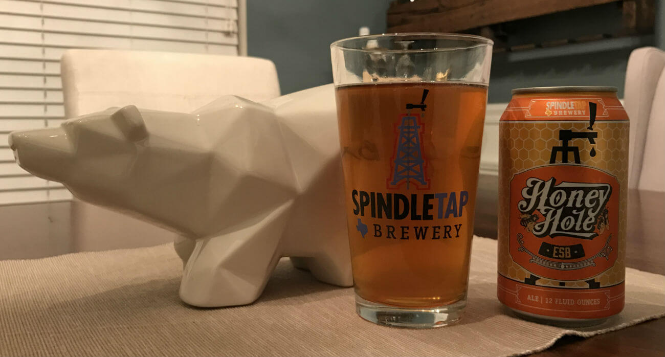 beer-chronicle-houston-craft-beer-review-honey-hole-beer-in-spindletap-pint-glass-next-to-glass-bear
