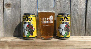 Beer-Chronicle-Houston-Craft-Beer-Review-Mama-Tried-Beer-In-Pint-Glass-With-Cans-On-Left-And-Right
