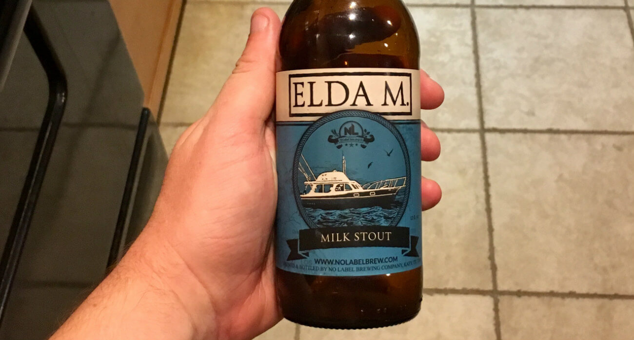 beer-chronicle-houston-craft-beer-review-no-label-elda-m-bottle-held-in-hand