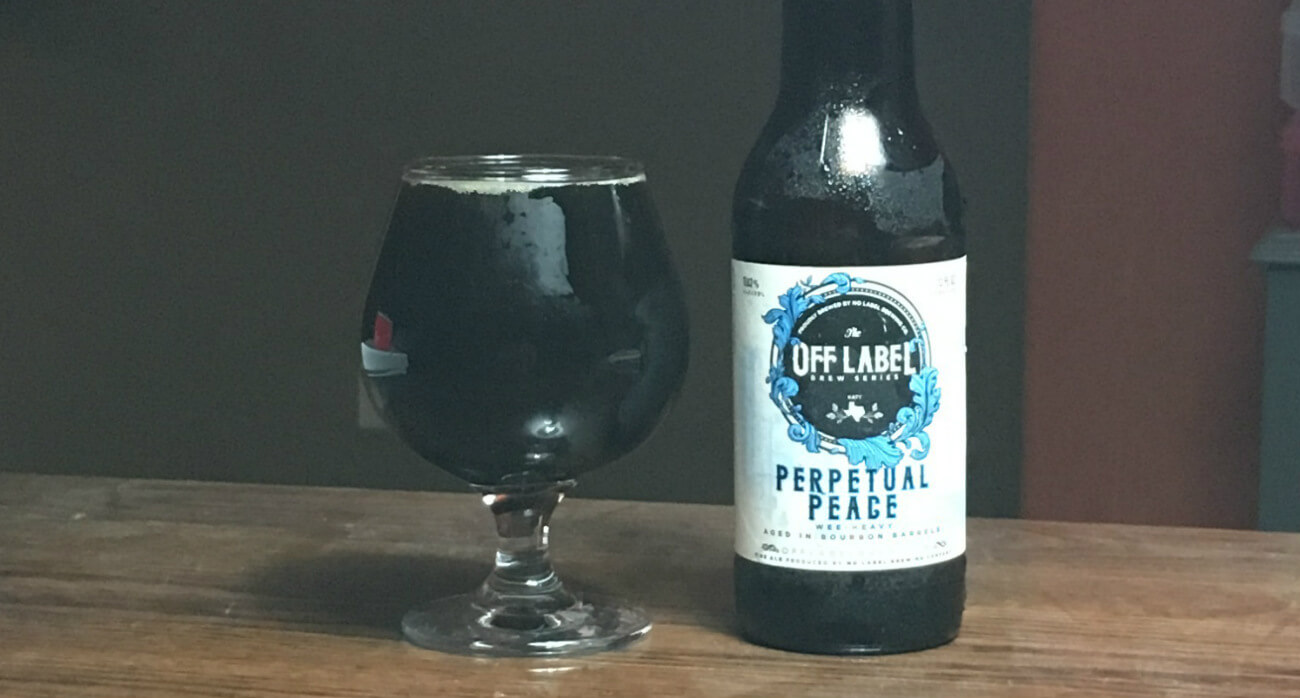 Beer-Chronicle-Houston-Craft-Beer-Review-No-Label-Perpetual-Peace-Full-Snifter-Next-To-Bottle