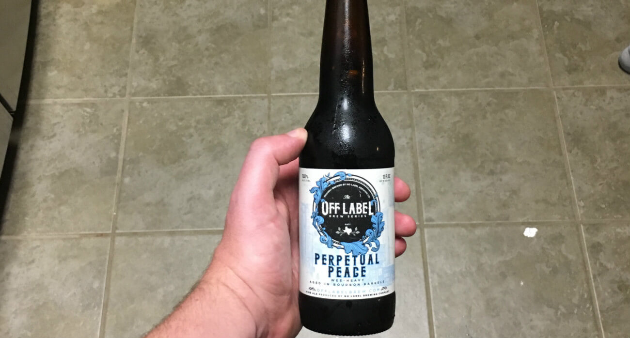 Beer-Chronicle-Houston-Craft-Beer-Review-No-Label-Perpetual-Peace-Bottle-In-Hand