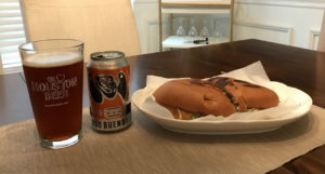 Beer-Chronicle-Houston-Craft-Beer-Review-Oso-Bueno-Beer-In-Pint-Glass-Next-To-Torta