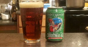 beer-chronicle-houston-craft-beer-review-saint-arnold-christmas-ale-full-pint-glass-next-to-can