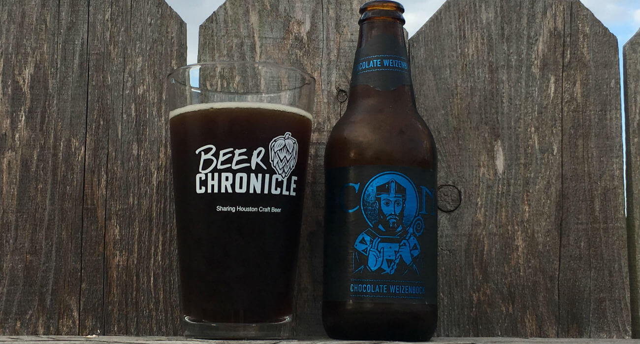 Beer-Chronicle-Houston-Craft-Beer-Review-Saint-Arnold-Icon-Blue-Chocolate-Weizenbock-Full-Glass-Next-To-Bottle