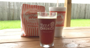 Beer-Chronicle-Houston-Craft-Beer-Review-Saytrs-Swill-Beer-In-Pint-Glass-With-Whataburger